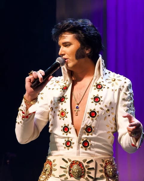 Jimmy Holmes, tribute artist, as Elvis Presley